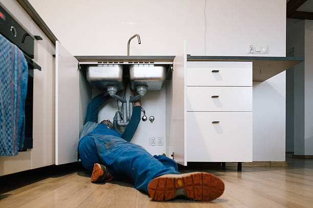 Professional Drain Cleaning technician working in Live Oak, FL